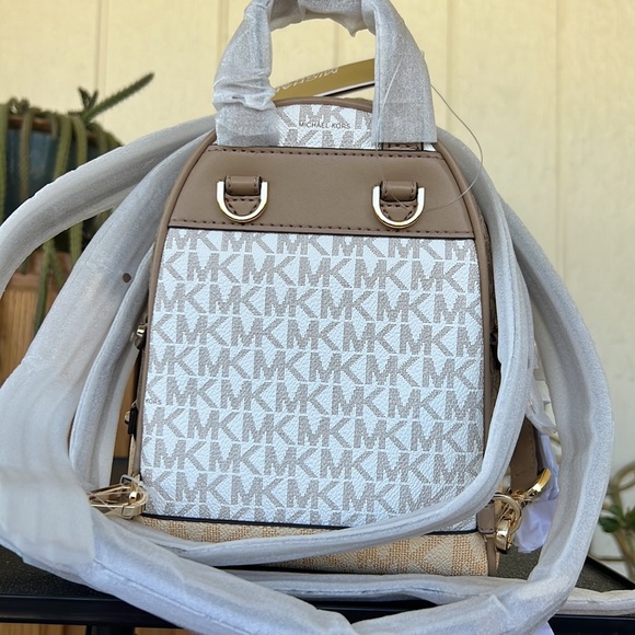 29. Michael Kors Signature Rhea Zip XS Backpack - Picture 8 of 10